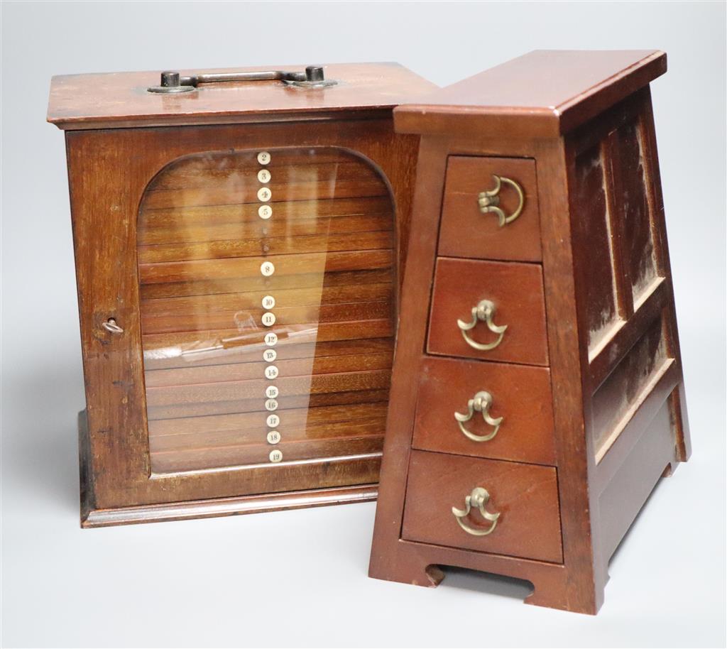 A Victorian mahogany coin collectors cabinet, 27cm wide, and a mahogany table top bank of four drawers